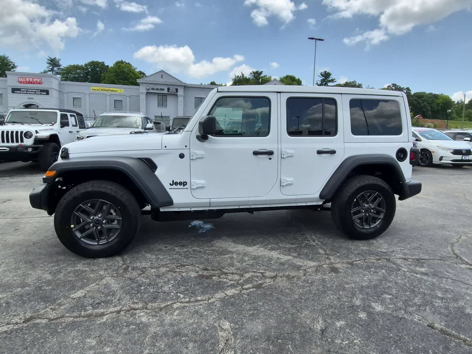 2026 Jeep Wrangler — rear three-quarter view