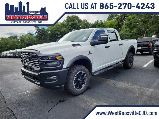 2026 RAM 2500 RAM 2500 WARLOCK CREW CAB 4X4 6'4' BOX in Bright White Clear-Coat Exterior Paint — front three-quarter view