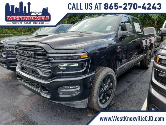 2026 RAM 2500 RAM 2500 LARAMIE CREW CAB 4X4 6'4' BOX in Diamond Black Crystal Pearl-Coat Exterior Paint — front three-quarter view