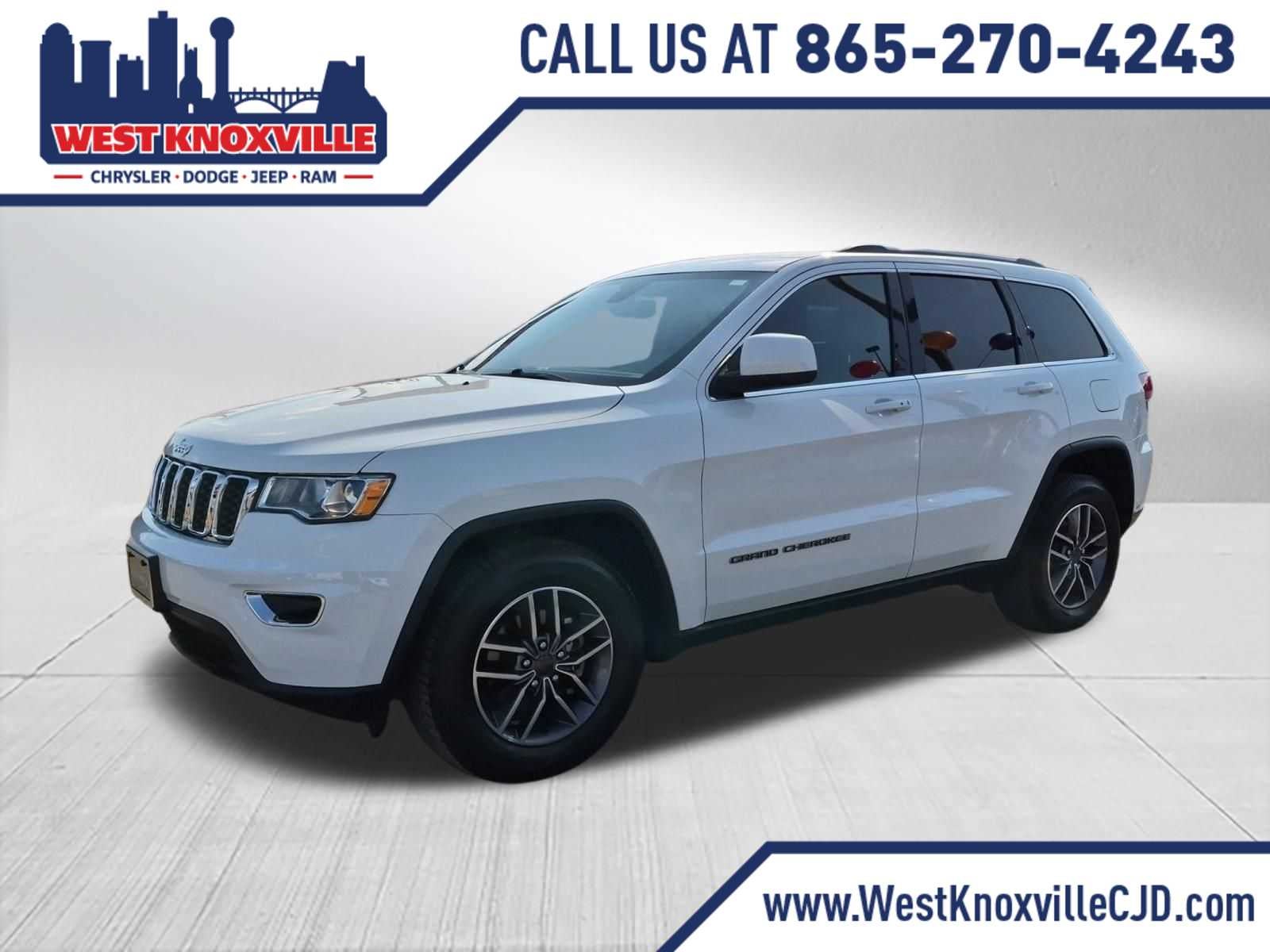 2020 Jeep Grand Cherokee Laredo E in Bright White Clearcoat — front three-quarter view