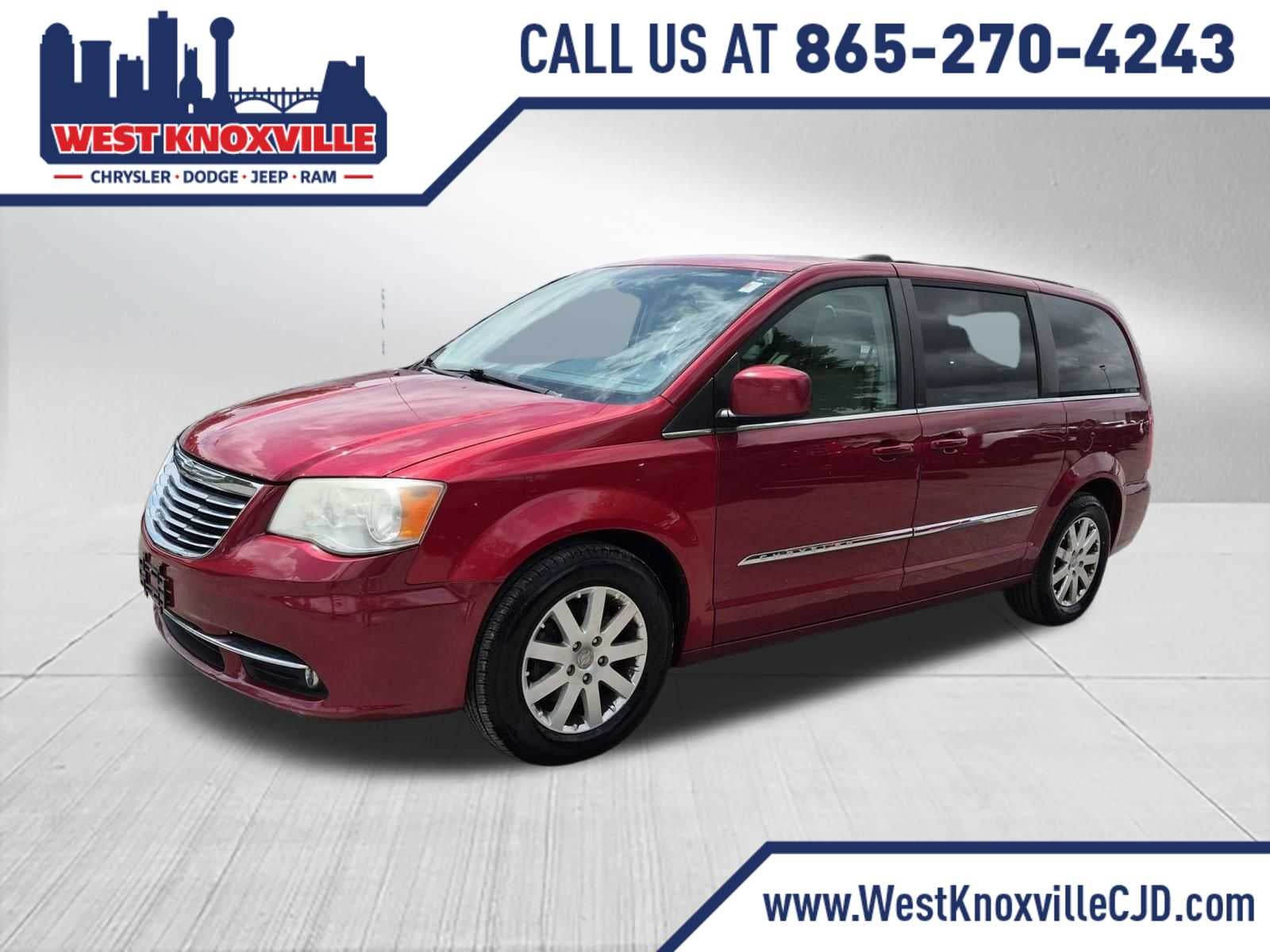 2013 Chrysler Town & Country Touring in Deep Cherry Red Crystal Pearl — front three-quarter view