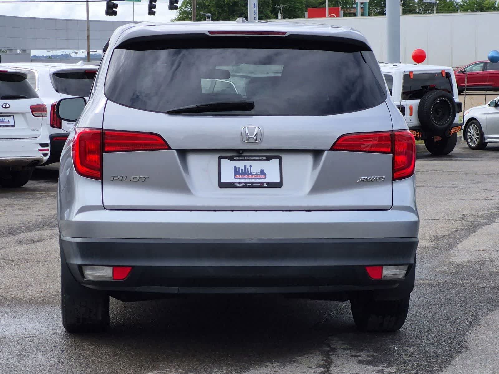 2016 Honda Pilot — rear three-quarter view