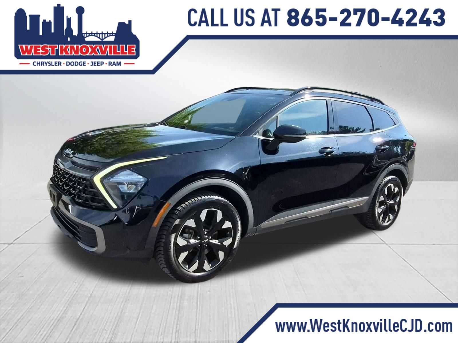 2023 Kia Sportage X-Line in Ebony Black — front three-quarter view